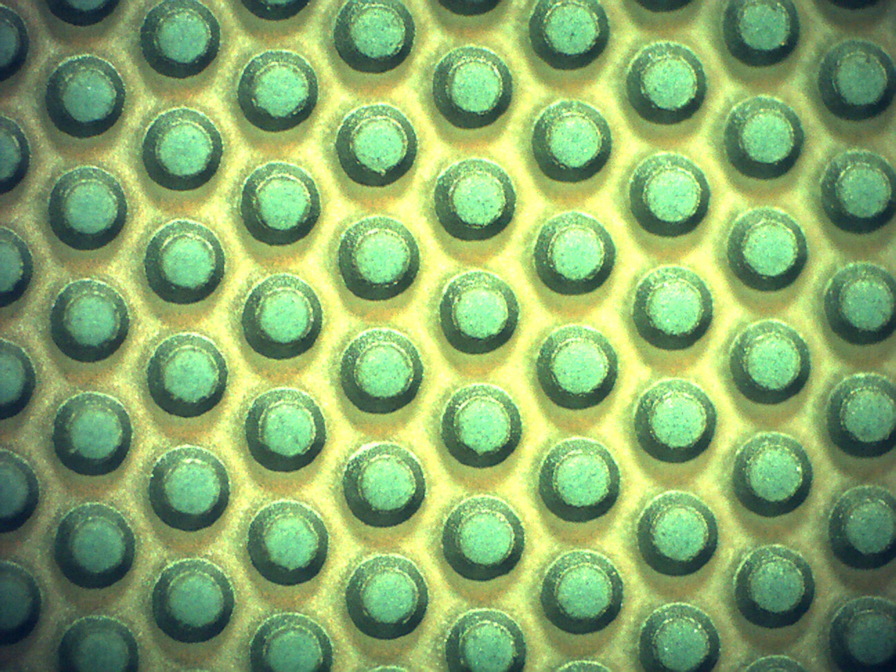 Mesa Diodes Manufacturing | Microscopic Image - the top of the mesa 0.019” (482 microns) and the bottom is 0.027” (684 microns)