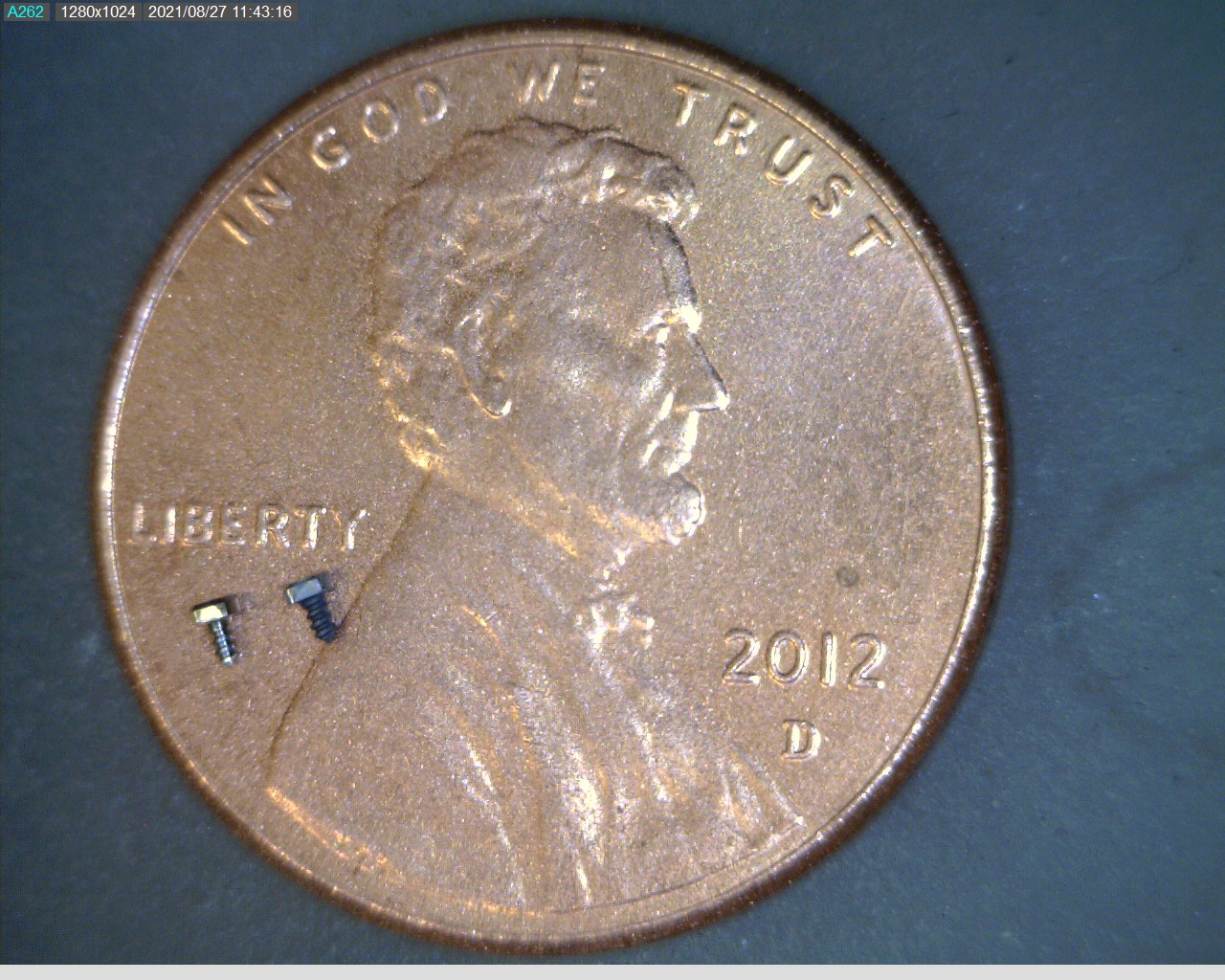 Screws on a penny - before and after