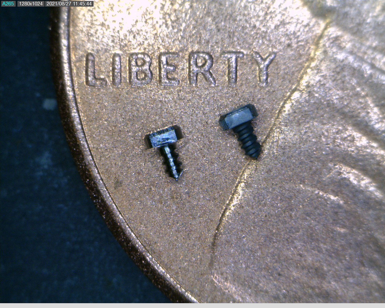 Screws on a penny - before and after
