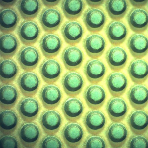 Mesa Diodes Manufacturing | Microscopic Image - the top of the mesa 0.019” (482 microns) and the bottom is 0.027” (684 microns)